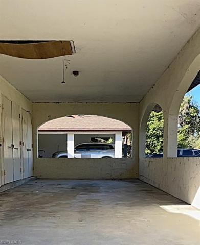 Carport with Storage and water closet.