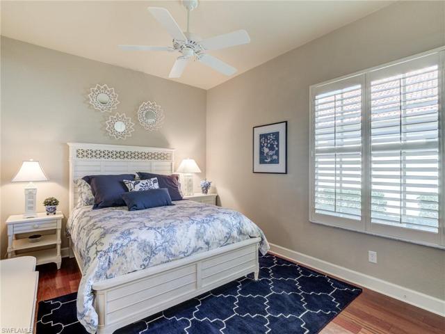 Guest bedroom 2 with wood flooring