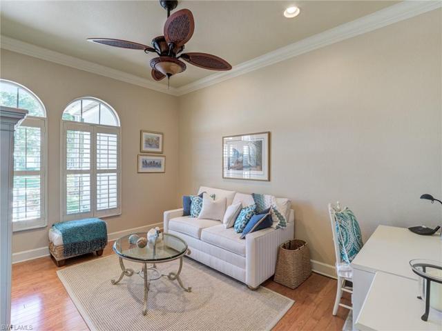Den with wood floors to match the dining room