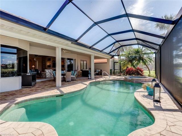 The large lanai is totally storm protected by fabric roll-down electric shutters