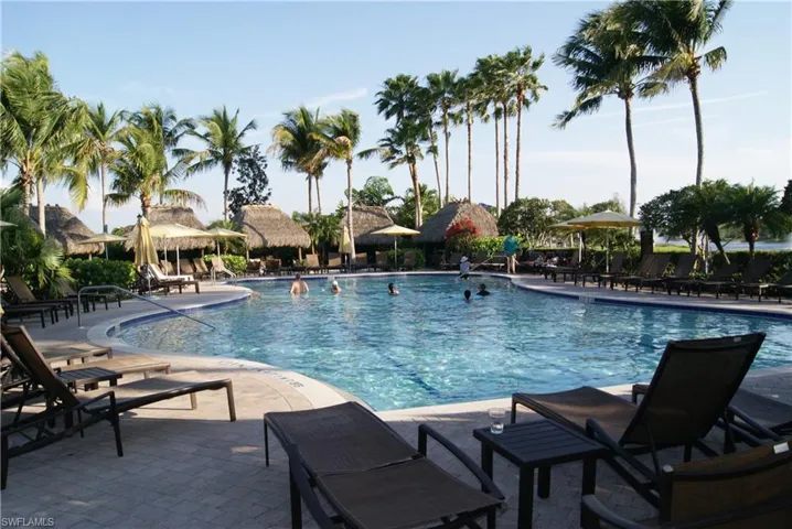 large lap pool with tropical cabanas one of 3 pools