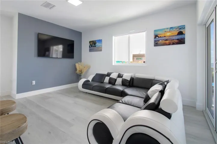 Living room featuring light hardwood / wood-style flooring