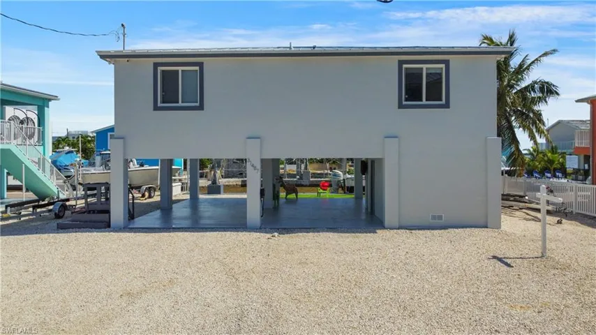 Back of house with a patio area