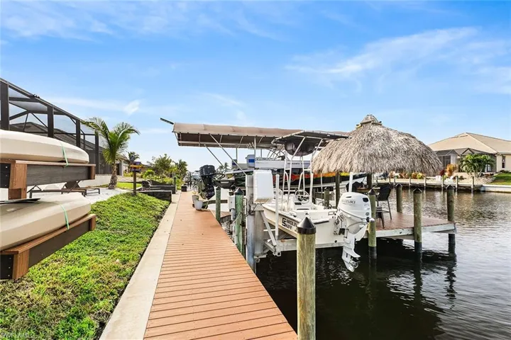 View of composite dock featuring canal view