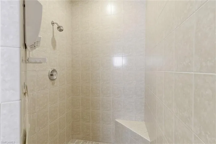A serene escape—oversized walk-in shower designed for ultimate comfort and style.