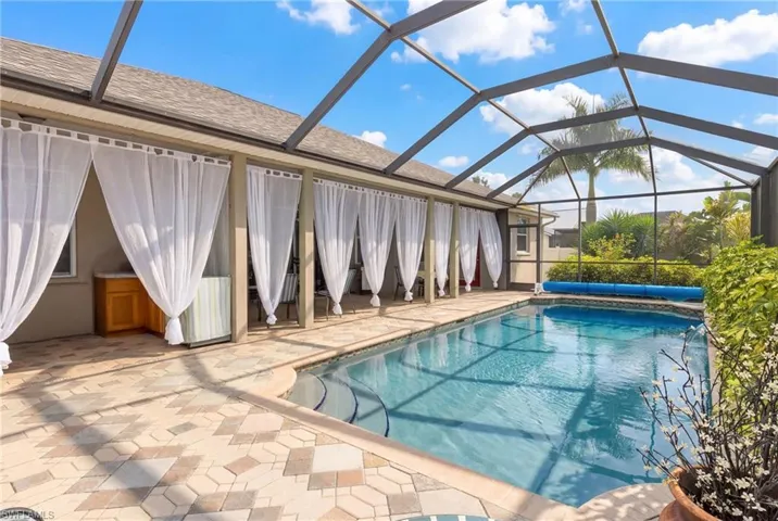 Dive into luxury—inviting pool area perfect for entertaining, relaxing, or soaking up the sun.