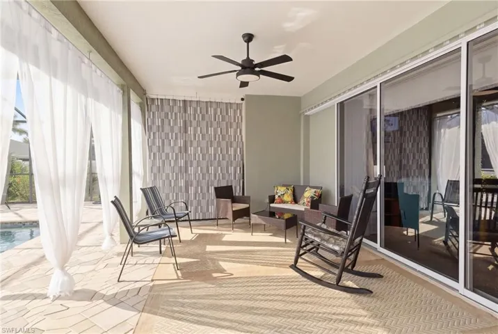 Step outside to serenity—lanai provides shade, comfort, and an unbeatable pool view.