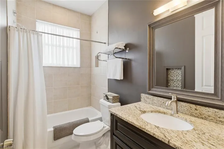 A stylish retreat—guest bath designed for comfort and convenience.