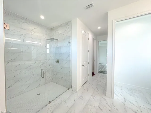 Master Bathroom featuring walk in shower