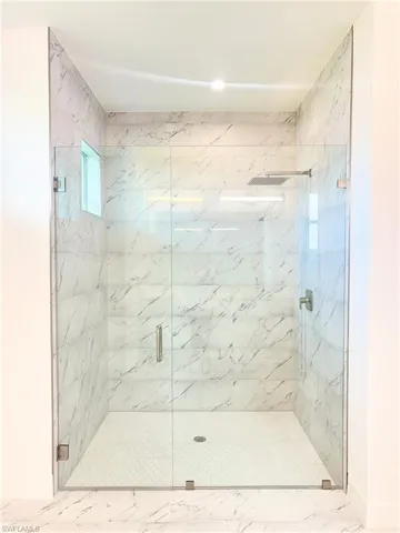 Master Bathroom featuring walk in shower