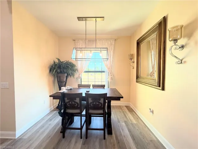 Dining room with light wood-type flooring