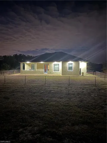 View of front of home with stucco siding