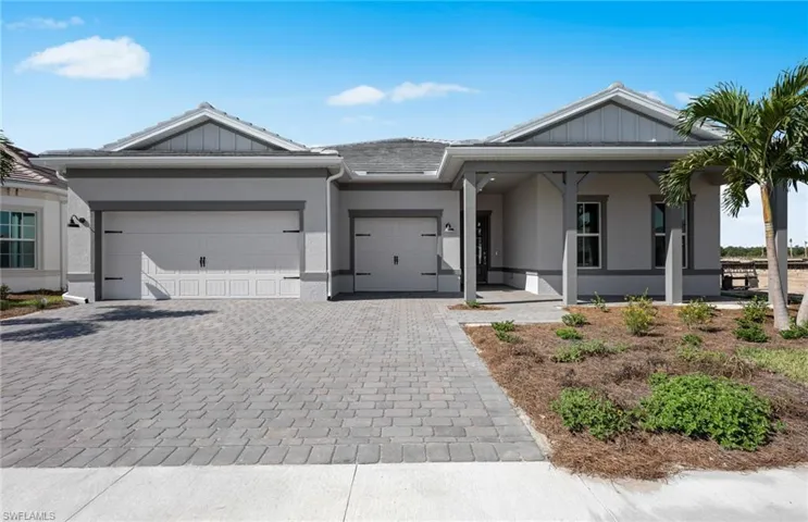 View of front of home with a garage