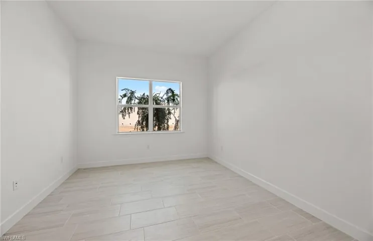 View of tiled spare room