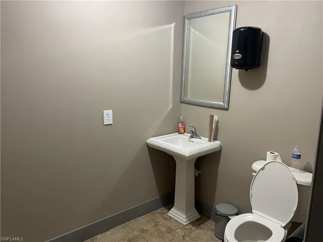 Bathroom featuring toilet and sink