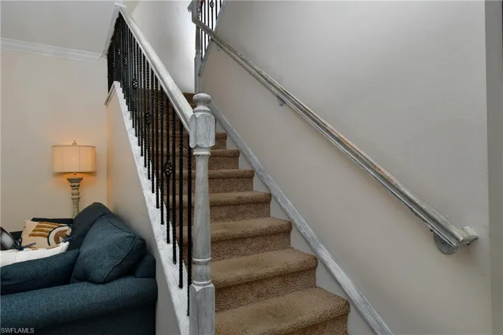 Staircase with crown molding