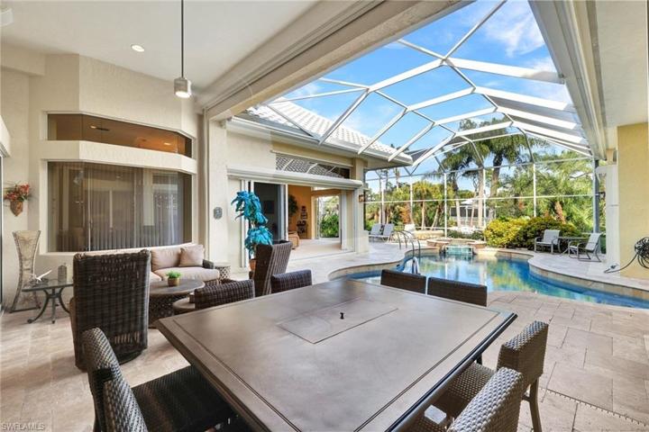 The family will love to gather together on this lanai while enjoying the sound of the waterfall behind the home.