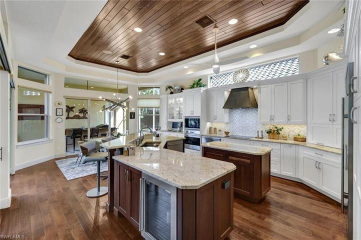 Premium kitchen cabinets/countertops, a wine cooler, plenty of pull out drawers, a center island and much more!