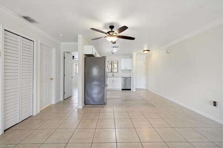 The open kitchen really enhances the size of this space