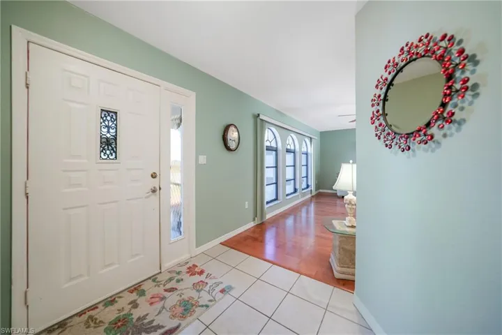 Foyer featuring light tile patterned floors
