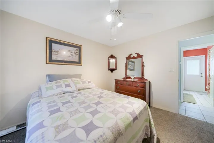 Bedroom with carpet floors and ceiling fan