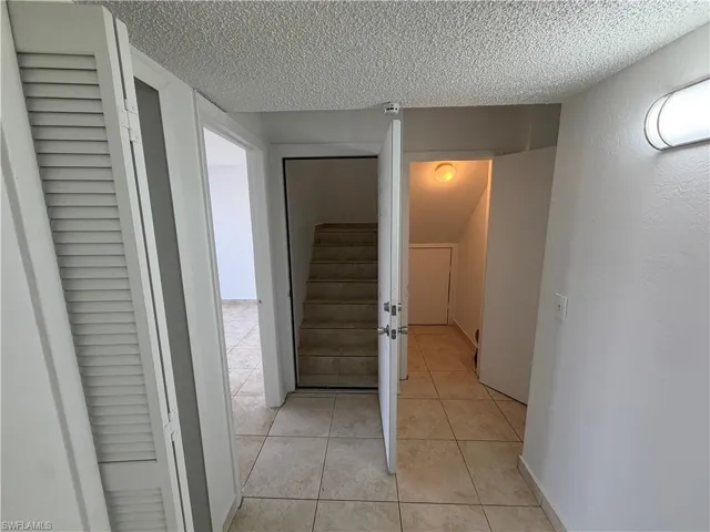 Hallway, stairs, extra storage room