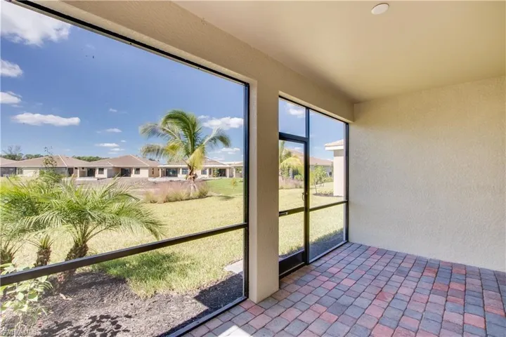 Unfurnished sunroom featuring a residential view