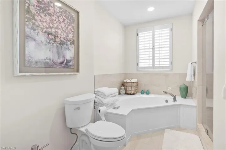 Bathroom with separate shower and tub and toilet