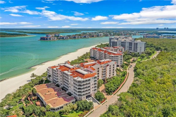 Bird's eye view featuring a view of the beach and a water view