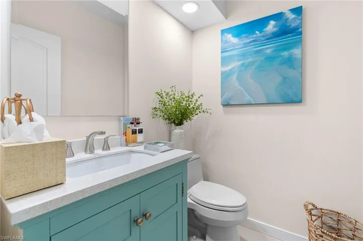 Bathroom with vanity and toilet
