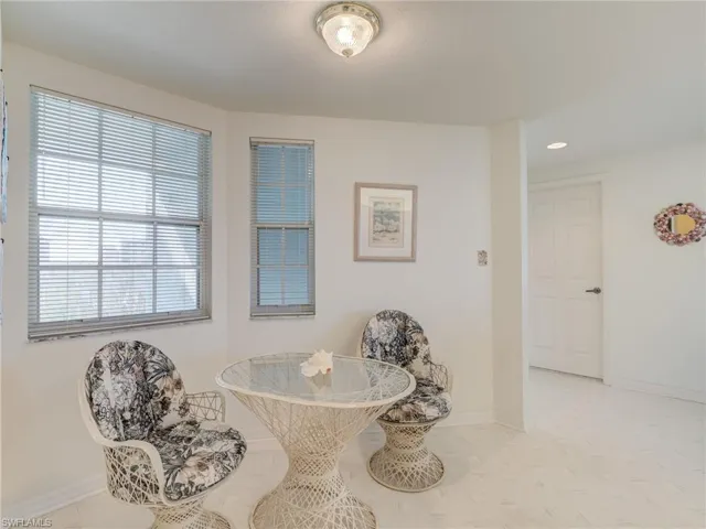 Dining area with baseboards and recessed lighting