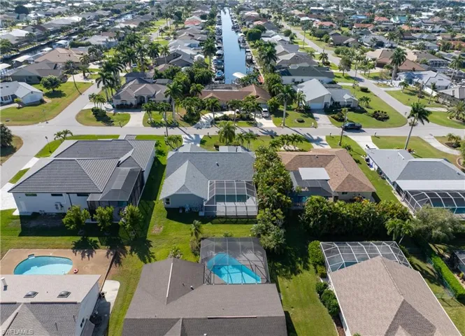 Aerial view of residential area and surrounding homes
