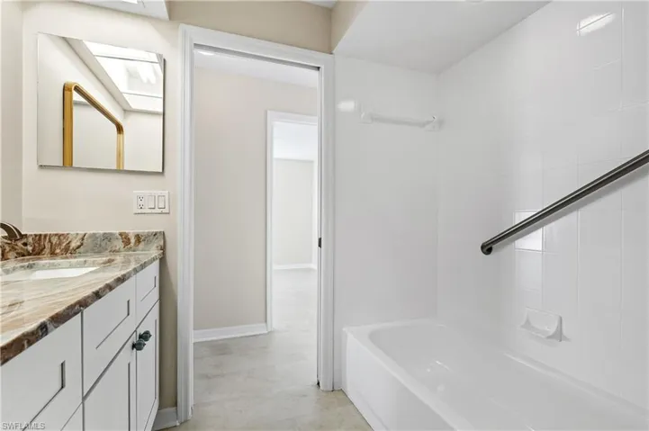 Guest /Pool Bath  bath with vanity  tub / shower combination