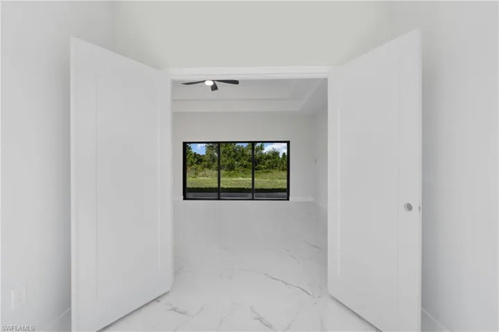 Spare room featuring ceiling fan