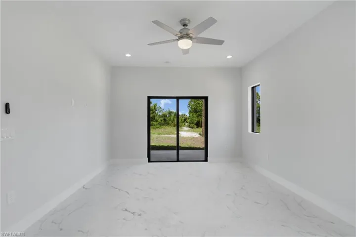 Unfurnished room with ceiling fan