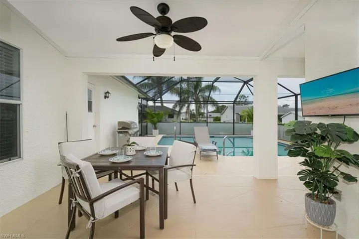 Outdoor Living Space with TV, Room to Entertain & Dine
