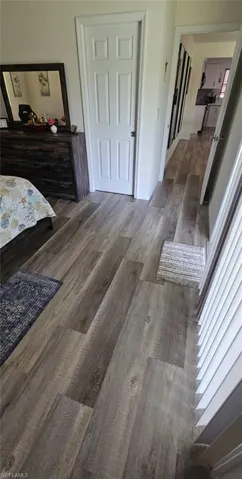 Bedroom featuring wood finished floors