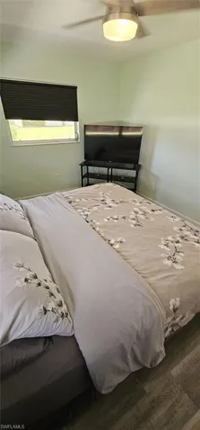 Bedroom featuring a ceiling fan