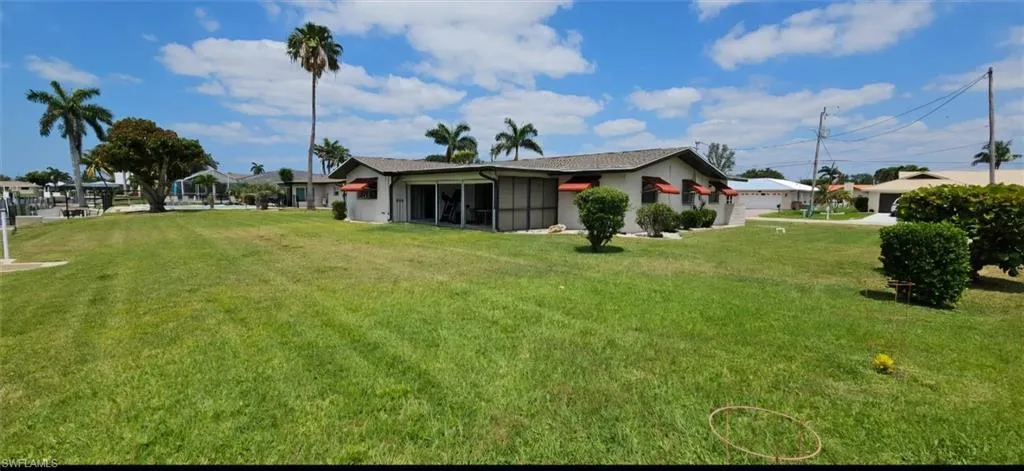 View of yard featuring a garage