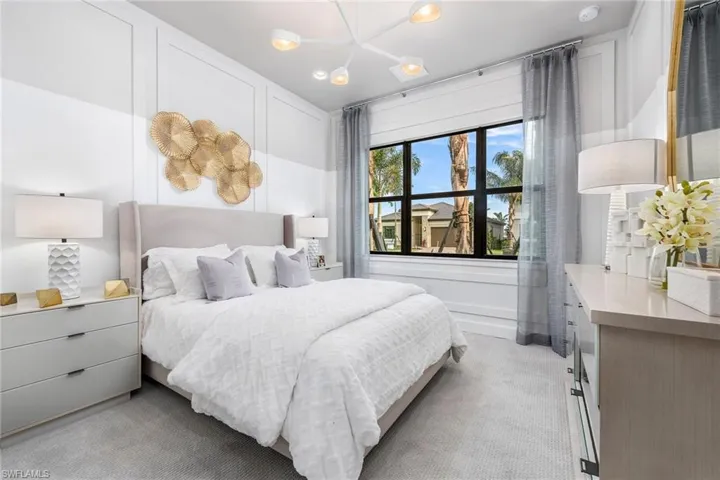Bedroom with recessed lighting and light colored carpet