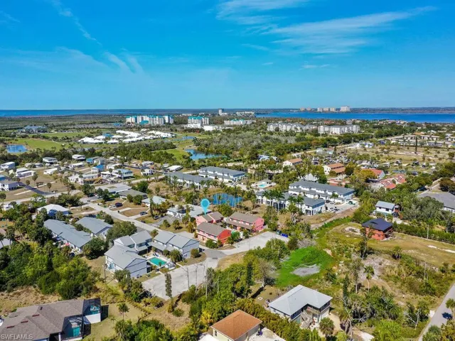 Aerial view of residential area with a nearby body of water