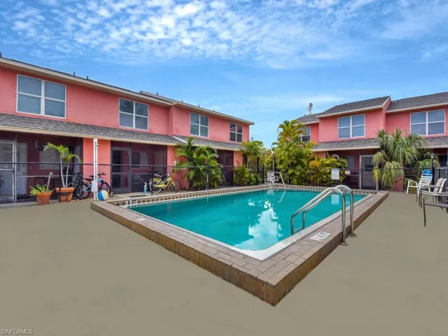 Community pool featuring a patio area