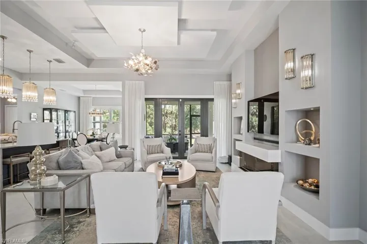 Living room featuring a chandelier