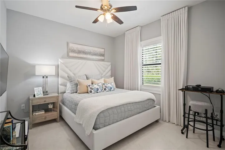 Bedroom featuring a ceiling fan