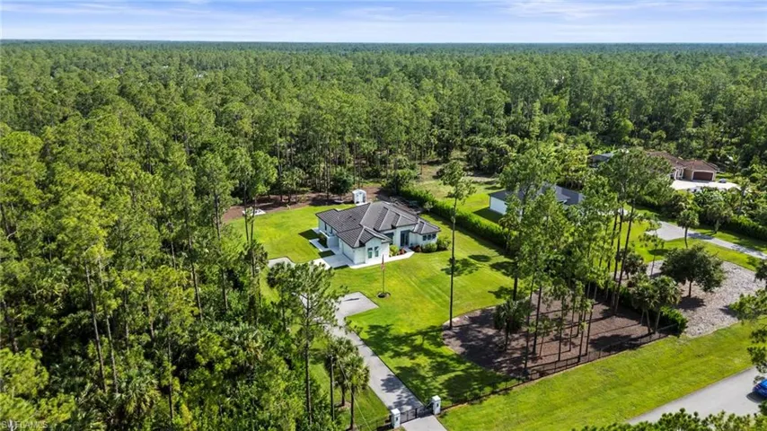 Drone / aerial view of a heavily wooded area
