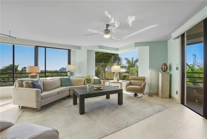 Tiled living area with a ceiling fan