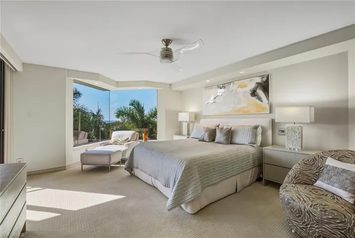 Bedroom featuring carpet, ceiling fan, and recessed lighting