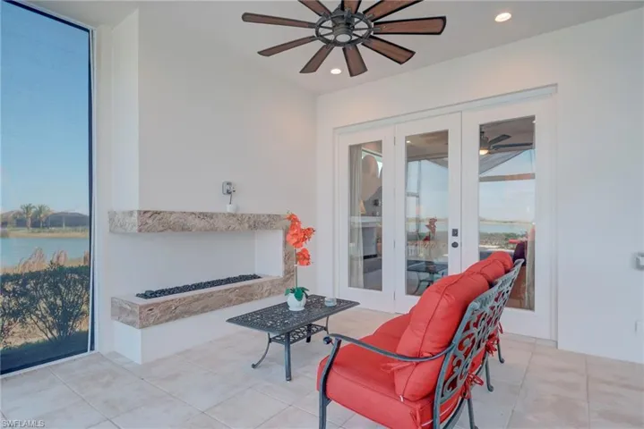 View of patio / terrace featuring french doors and a ceiling fan