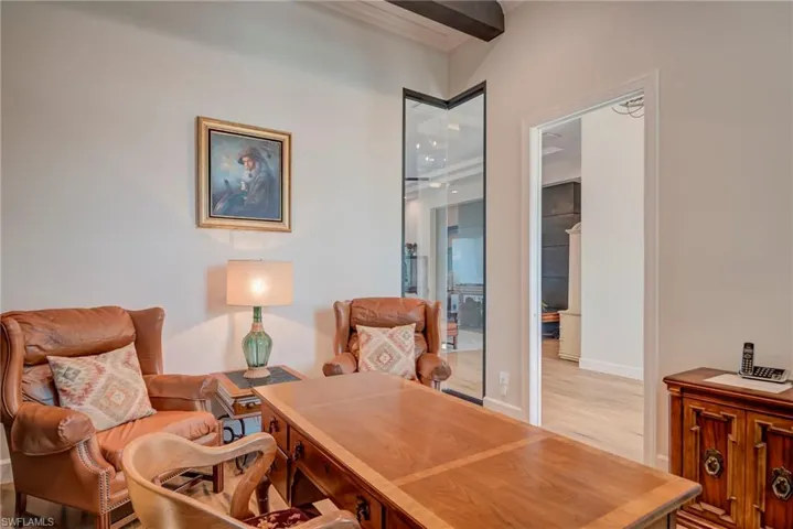 Office with wood finished floors