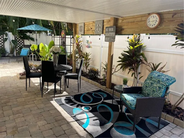Main house covered patio in the private courtyard area